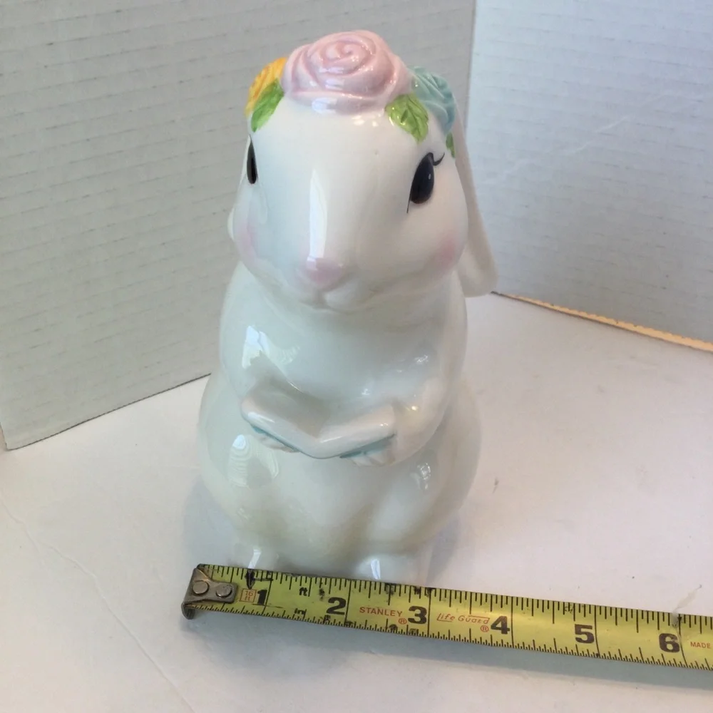 Ceramic Bunny Figurine holding book with Floral Accents